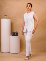 Classic White Power Suit with Sleeveless Blazer - Image 4